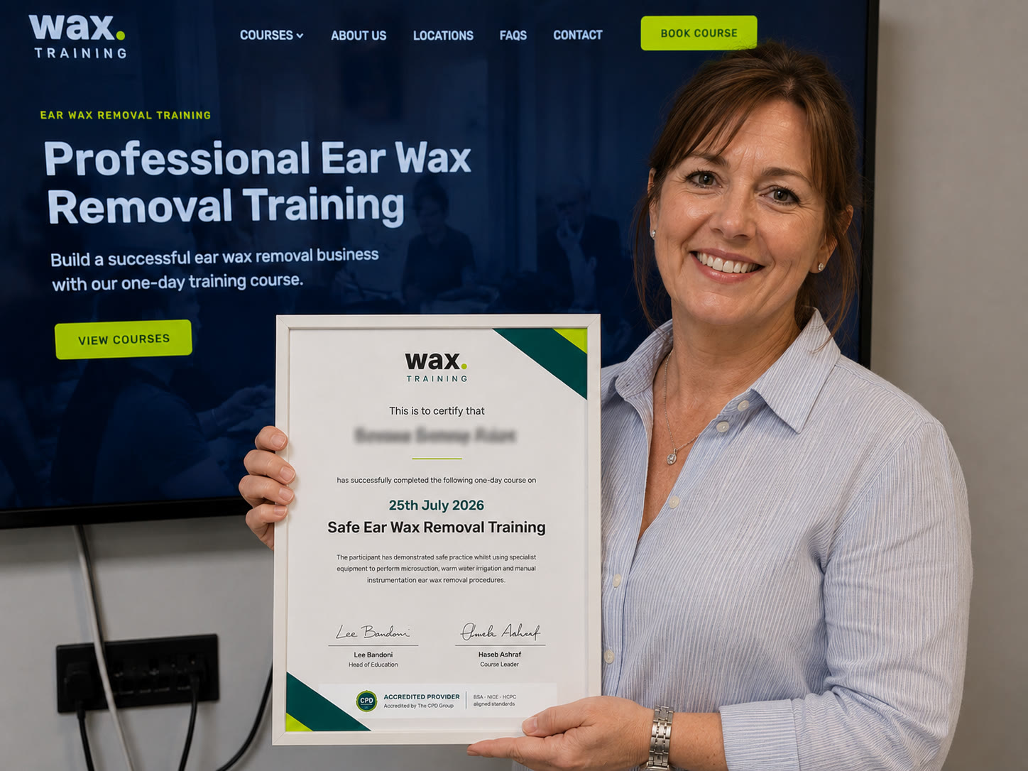 Claire, 51, District Nurse, after completing the wax. ear wax removal course