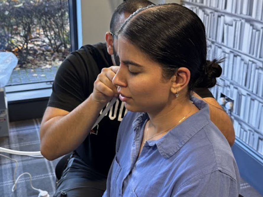 Trainee practising with Zoellner suction probe